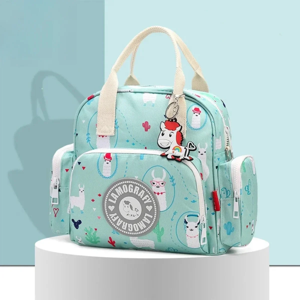 Petit sac à langer | lamo grafy - Boutique Bébé en Ligne : Soins, Jouets et Articles Maison Sac à Langer Câlinéo™ Multifonction | Chouchous les Bébés